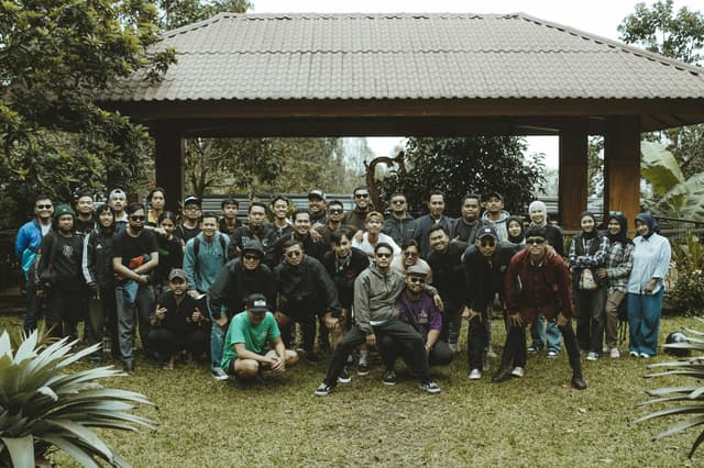 Happy camp counselors wearing sunglasses